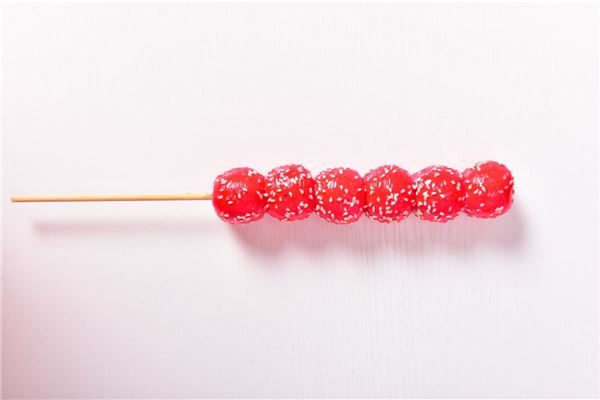 梦见女人糖葫芦是什么意思