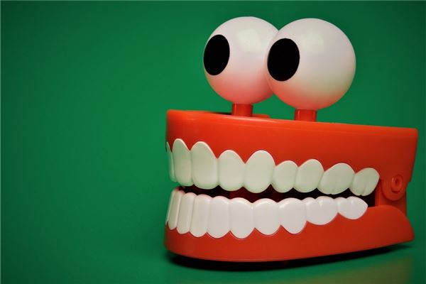 梦见牙龈脱落是什么意思