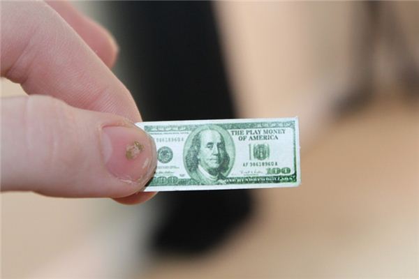 梦见捡假钱是什么意思